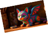 A colorful, intricately patterned cat figurine with wings sits on a wooden surface next to a small round object. Description generated by AI